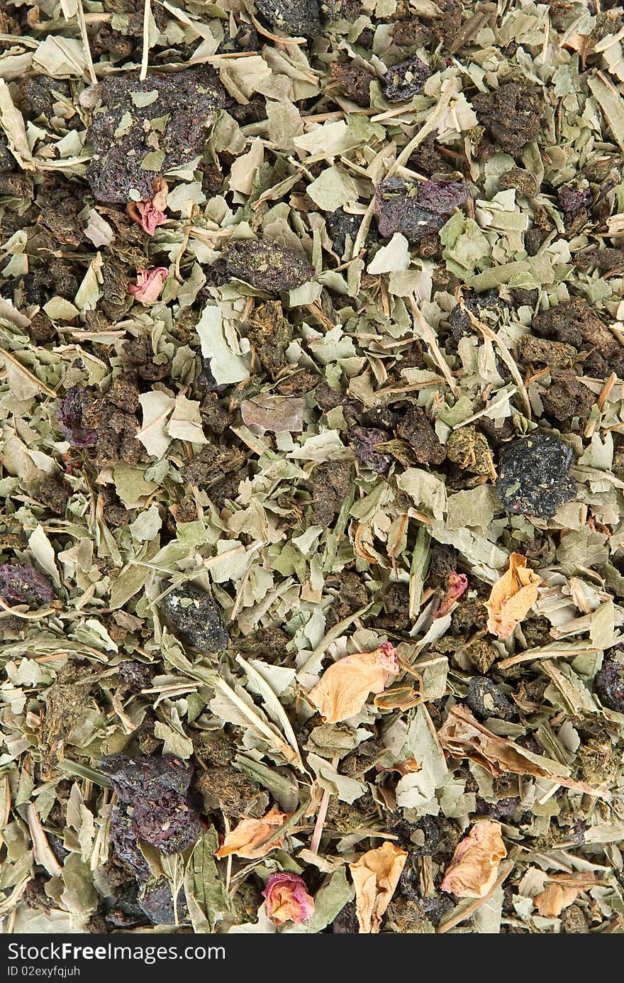 Background of dried flowers and tea leaves. Background of dried flowers and tea leaves