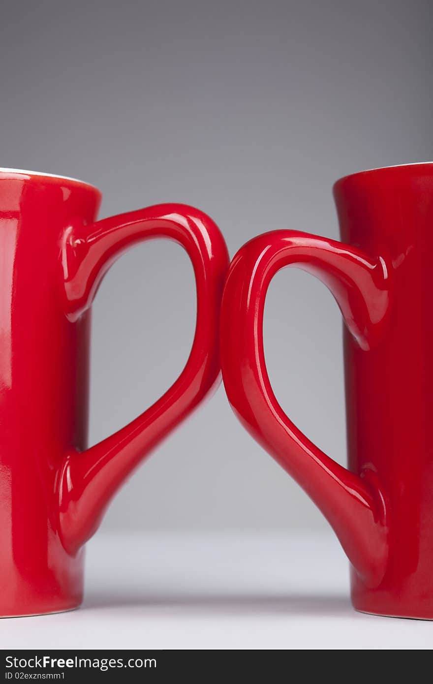 Red handle cups, representing the two halves of the heart