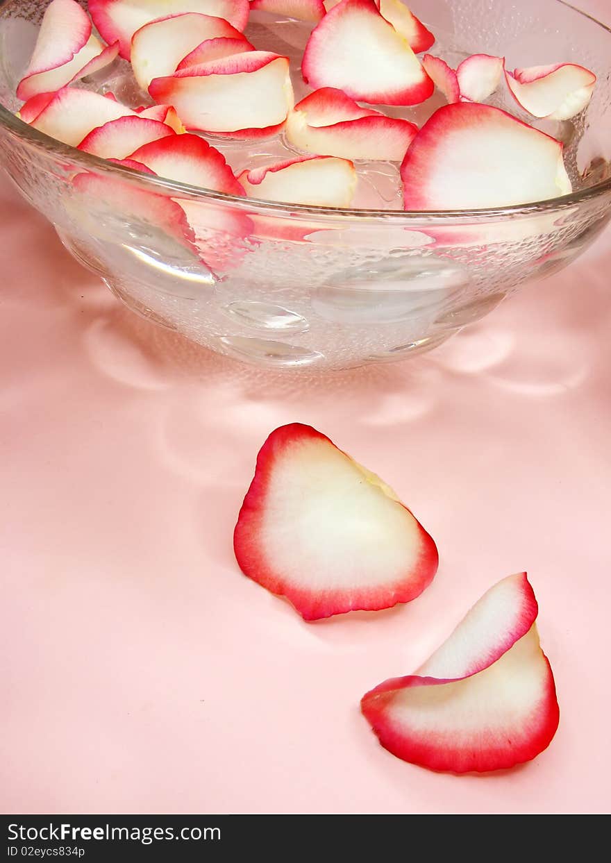 Water for spa with rose petals