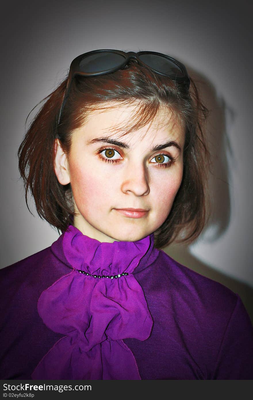 Young girl in violet dress