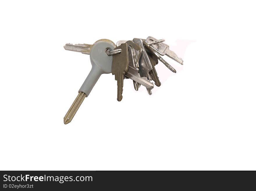 A bunch of old keys on an isolated background. A bunch of old keys on an isolated background