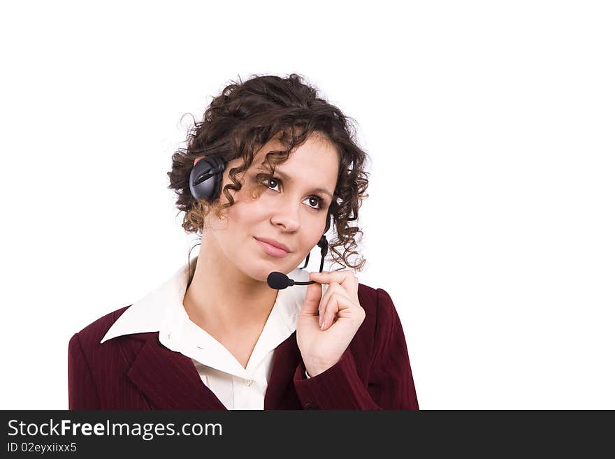 Successful businesswoman is speaking over the headset with a microphone. How can i help you? Face of young charming confident woman with headset. Successful businesswoman is speaking over the headset with a microphone. How can i help you? Face of young charming confident woman with headset.