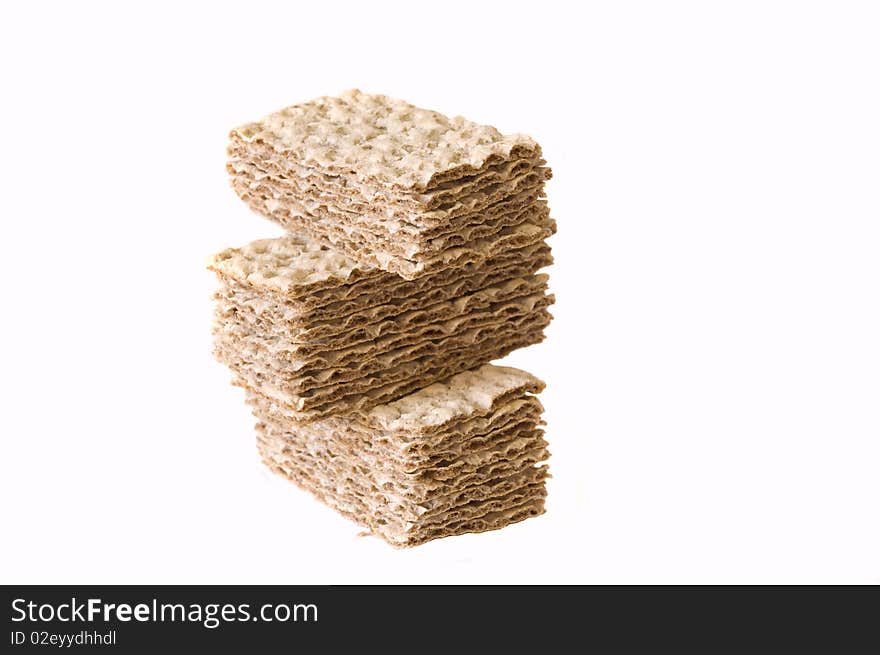 Stack of crackers isolated on a white background