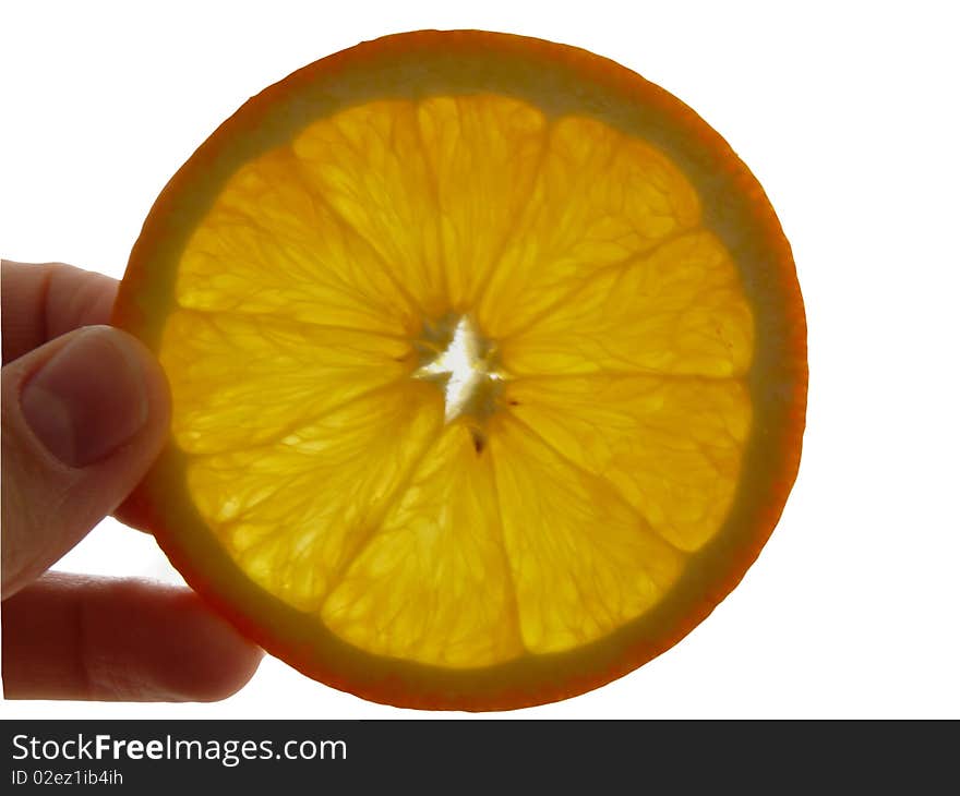 Orange in hand on white background