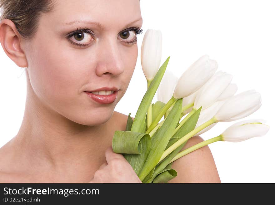 Pretty young woman portrait with white tulips. Portrait of beautiful woman before spa treatment. Beautiful female with white tulip. Pretty young woman portrait with white tulips. Portrait of beautiful woman before spa treatment. Beautiful female with white tulip