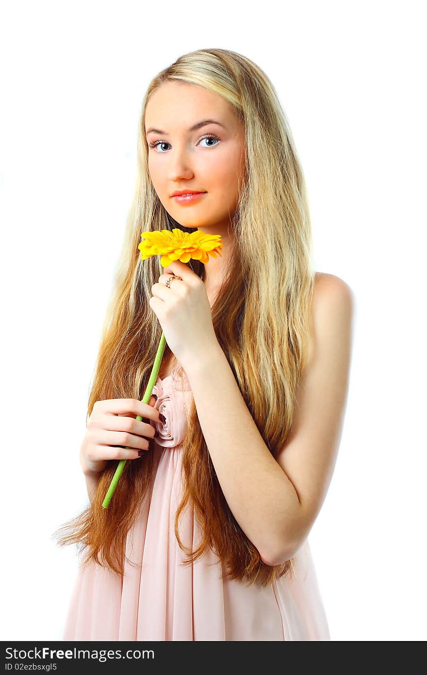 Young woman with a flower. Over white background