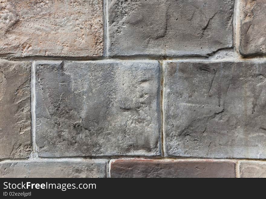 Multi-colored large slab brickwork closeup texture background. Multi-colored large slab brickwork closeup texture background