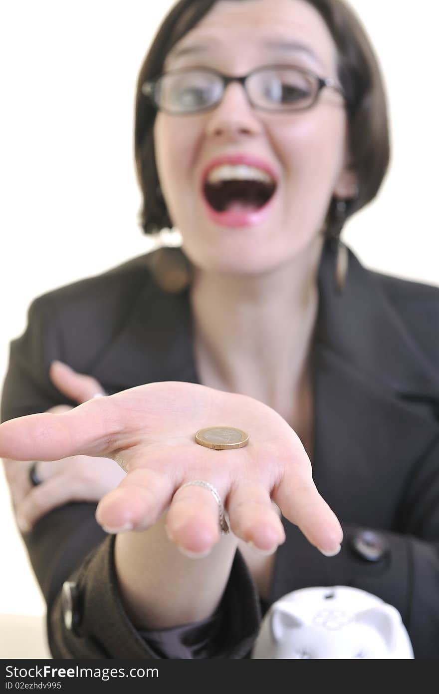 Business woman putting money coins in piggy bank