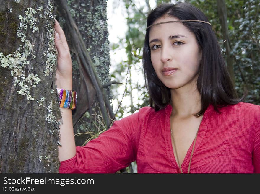 A precious woman teenager is modeling for the cameras in the nature. A precious woman teenager is modeling for the cameras in the nature