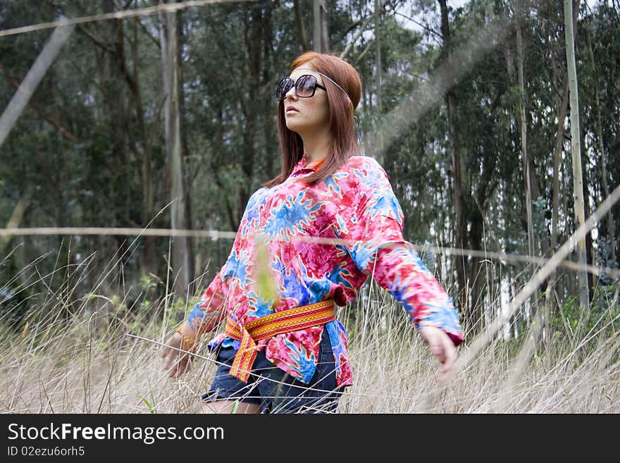 A stunning teenager hippie is feeling the nature. A stunning teenager hippie is feeling the nature