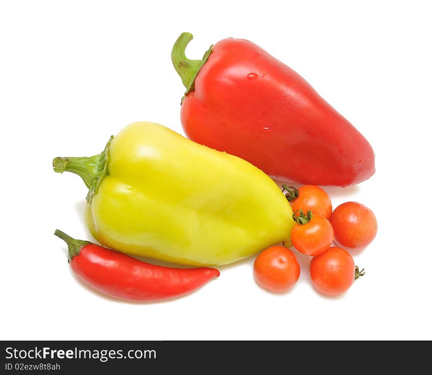 Red and yellow sweet paprika on white background