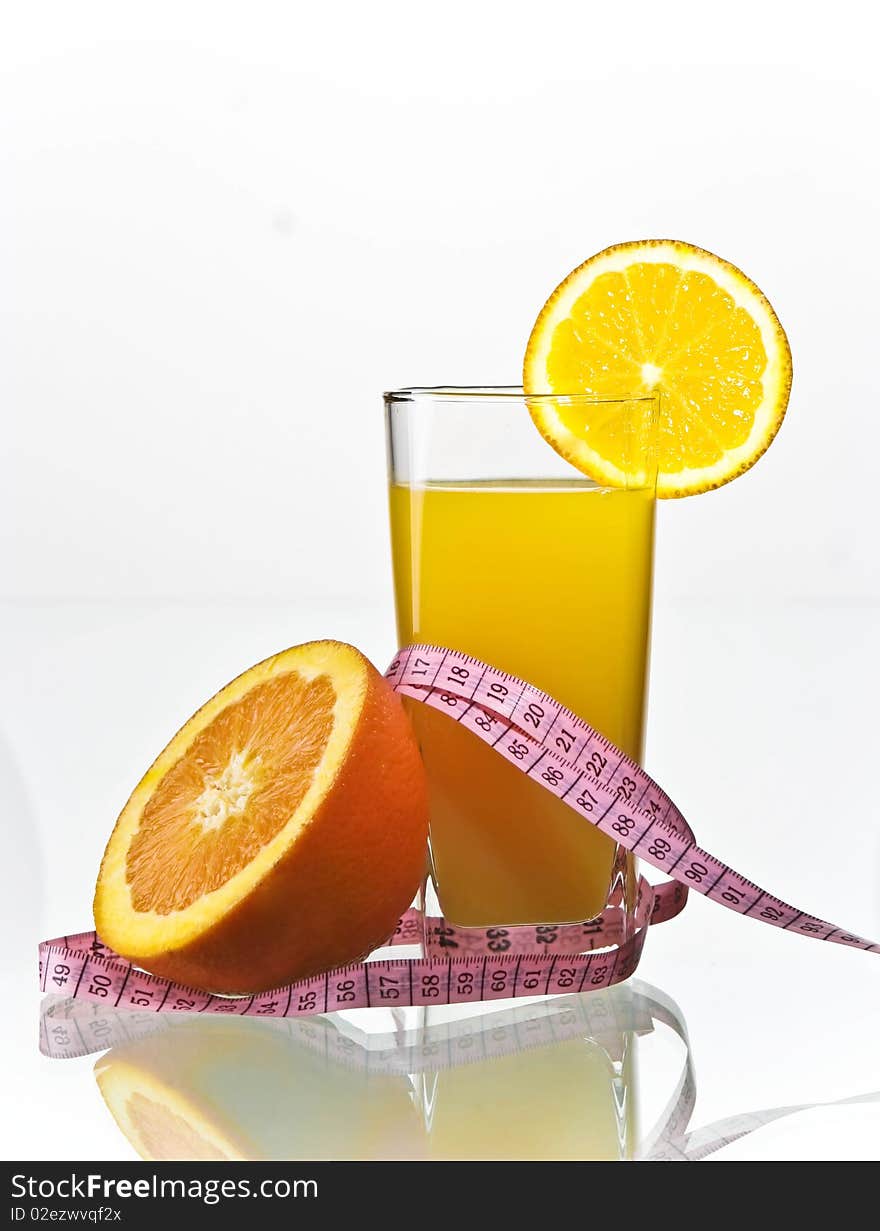 Orange juice for fitness with fruit on side