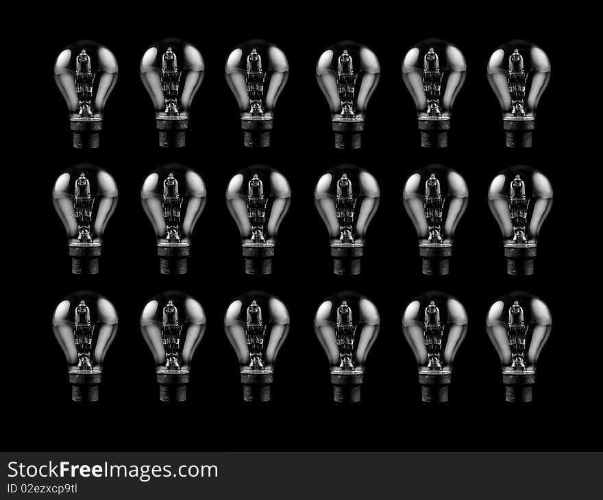 An energy saving light bulb isolated against a black background