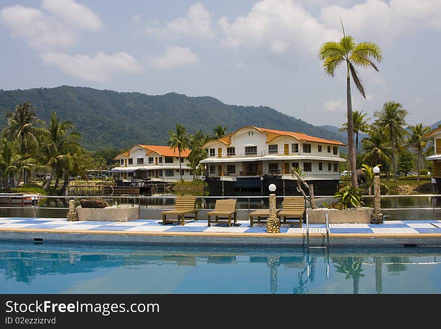 Tropical hotel on the background of mountains in Thailand