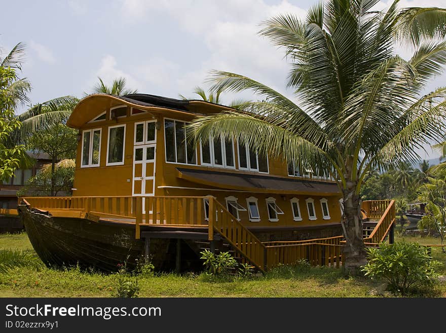 The hotel is shaped like a ship on the island.Thailand.