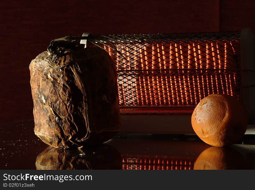 Here I made a composition with a rotten pumpkin and an orange which was rotten too.Here I used the natural light from the toater with some additional light source. Here I made a composition with a rotten pumpkin and an orange which was rotten too.Here I used the natural light from the toater with some additional light source