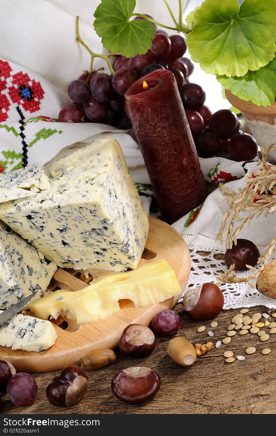 Closeup with blue cheese, fruits studio isolated,  traditional towel  in background. Closeup with blue cheese, fruits studio isolated,  traditional towel  in background