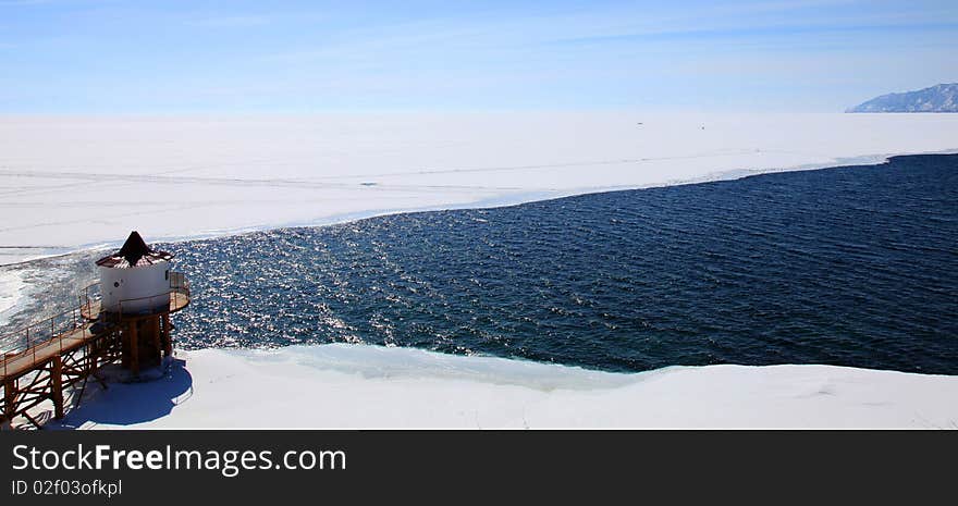 Frozen Lake Baikal. Spring. Day.