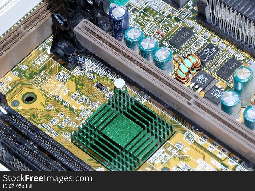 Motherboard, processor and other electronic computer components close up. Motherboard, processor and other electronic computer components close up