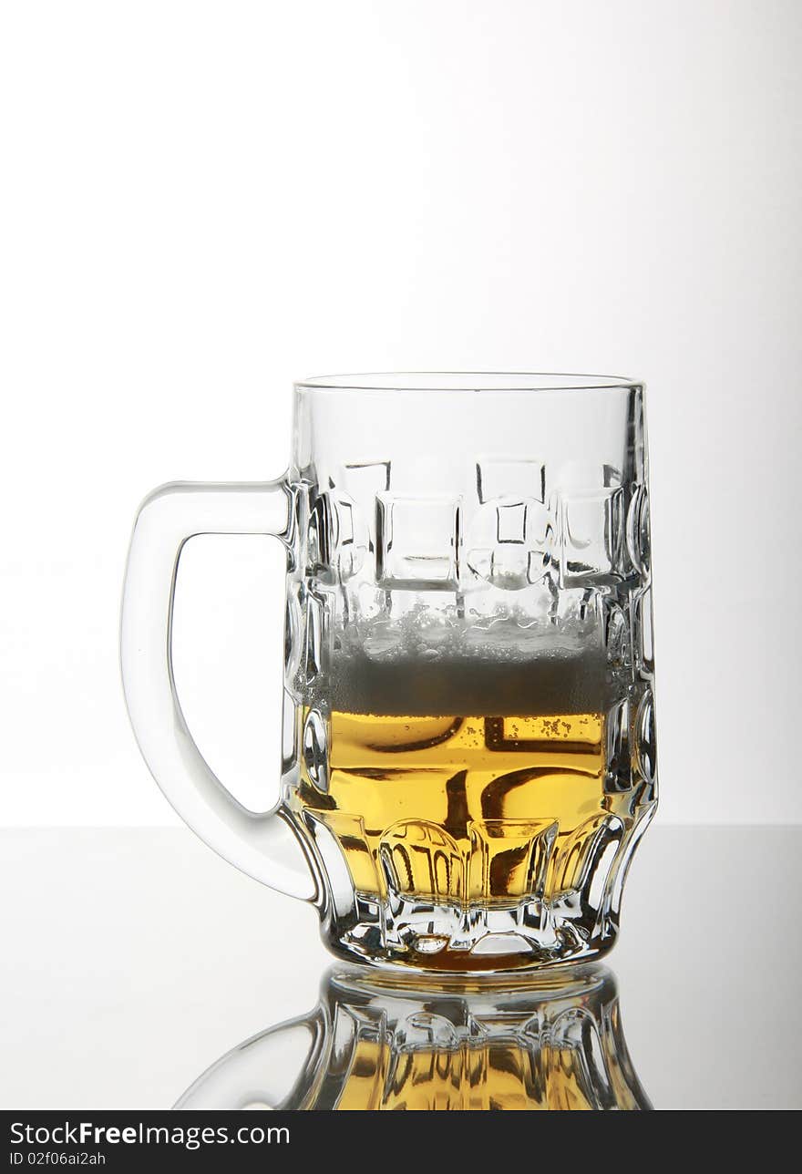 Pub mug on glass table