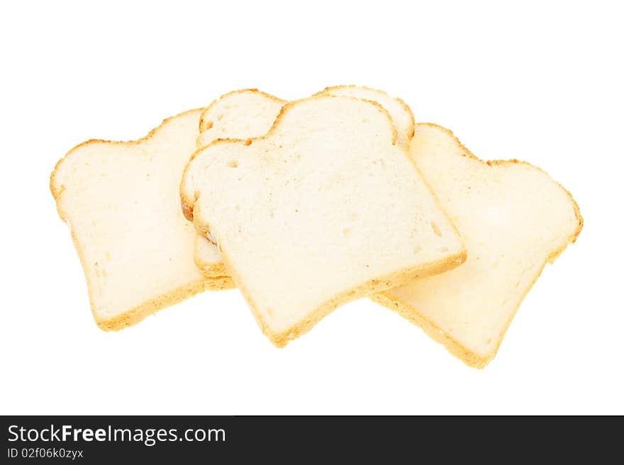 Slices of crusty white bread isolated on white. Slices of crusty white bread isolated on white