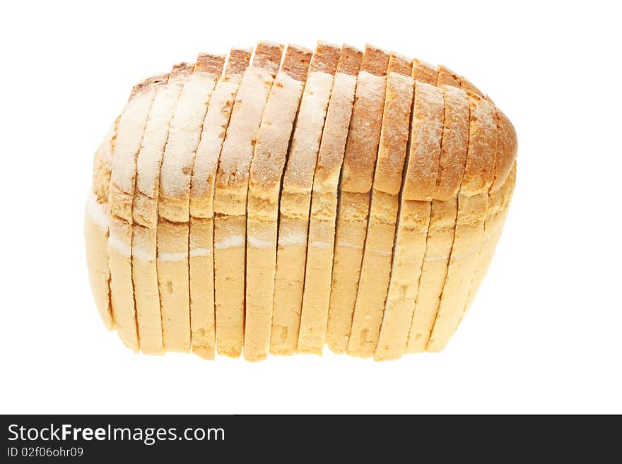 Sliced crusty farmhouse loaf of bread isolated on white. Sliced crusty farmhouse loaf of bread isolated on white