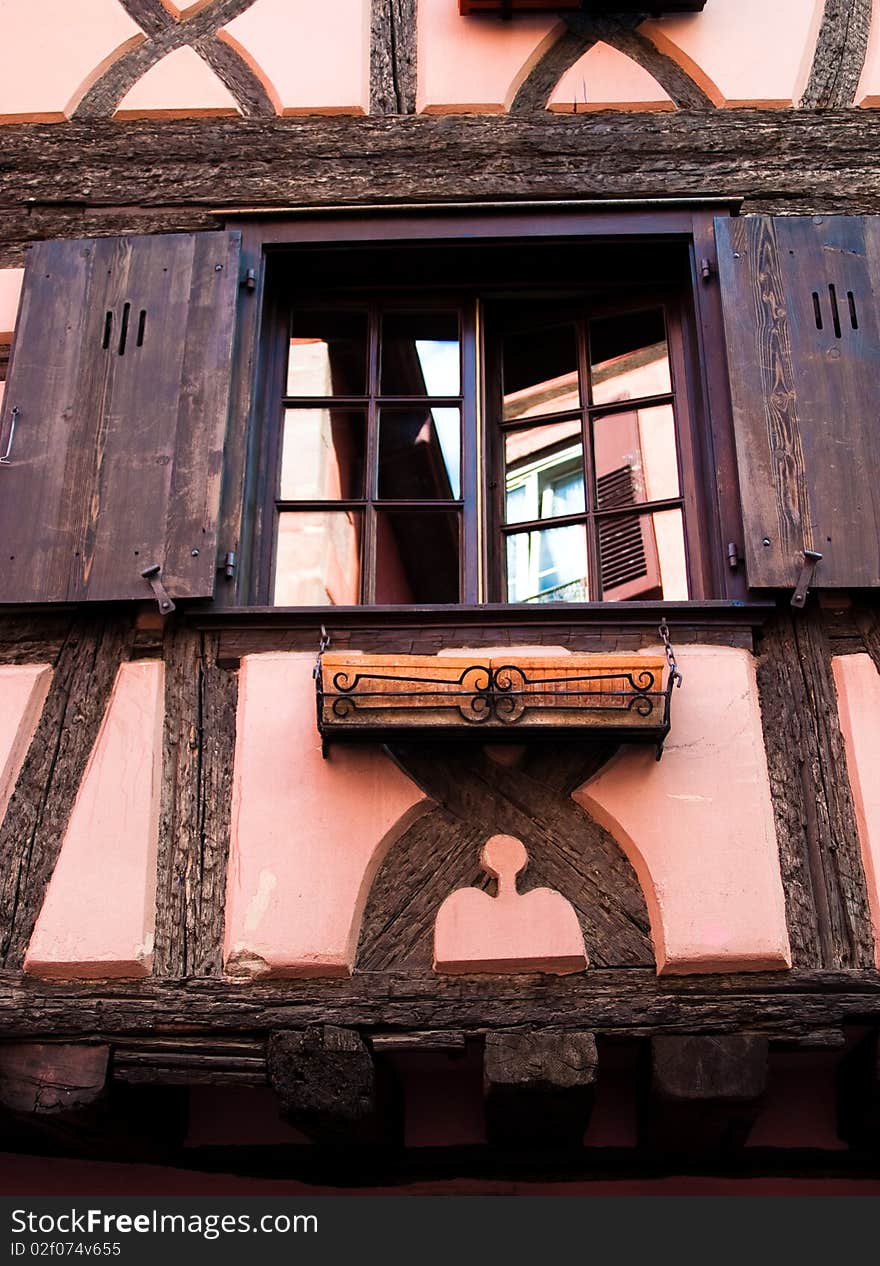 Traditional timber frame and stucco house in Riquewihr, , Alsace, France. Traditional timber frame and stucco house in Riquewihr, , Alsace, France