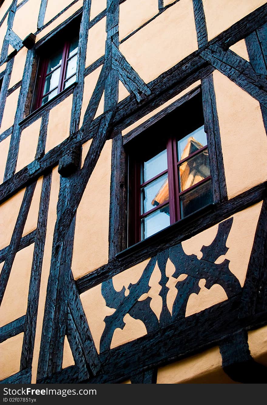 Traditional timber frame and stucco house in Riquewihr, , Alsace, France. Traditional timber frame and stucco house in Riquewihr, , Alsace, France