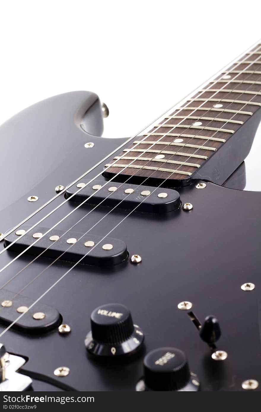 Black electric guitar on white background. Black electric guitar on white background