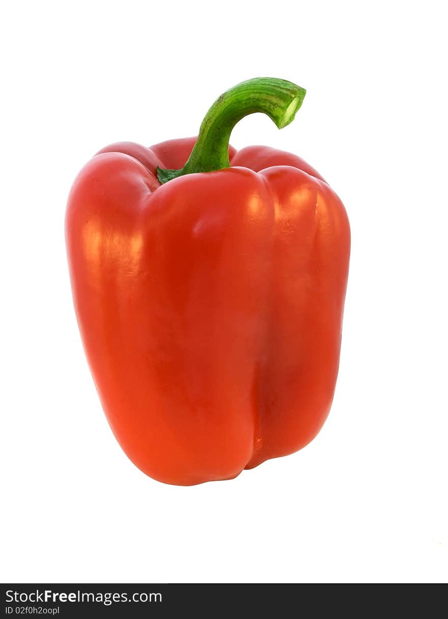 Fresh ripe red bell pepper on white