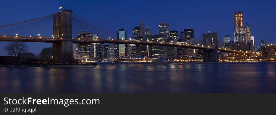 Panoramic of Brooklyn bridge at dawn