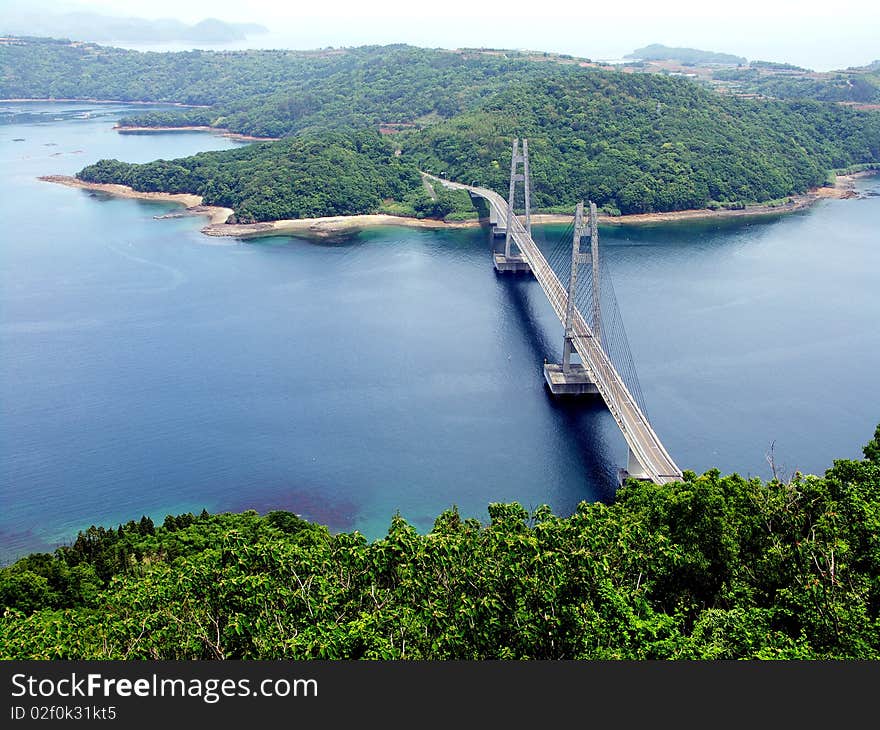 A bridge connects the island