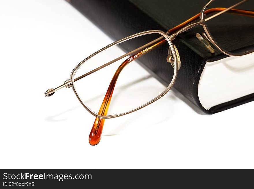 Book and glasses