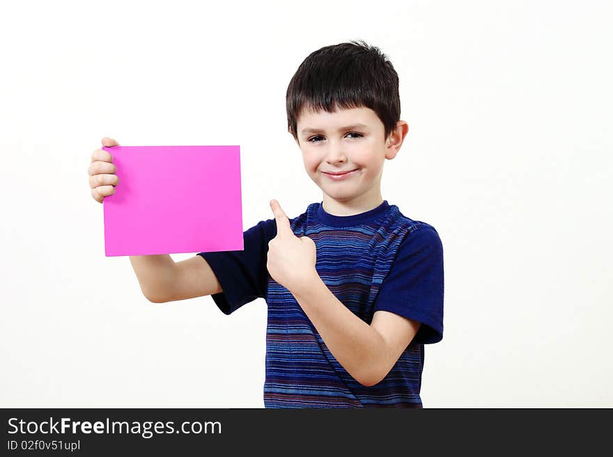 Boy with a color plate with space for your text on white background