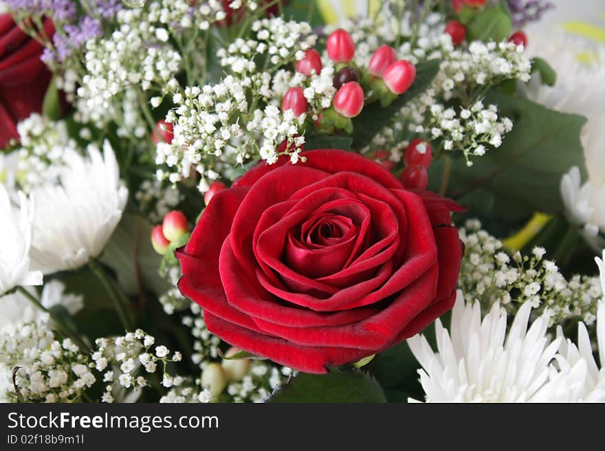 Fragment floral bouquet with a rose and chrysanthemum