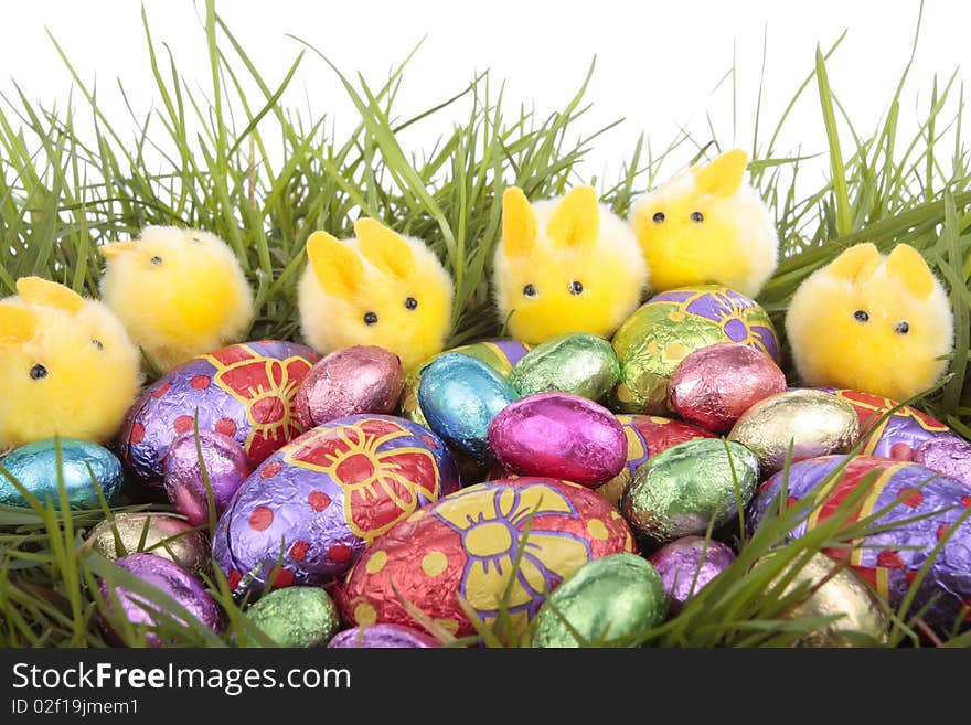 Easter bunnies and egg over white background. Easter bunnies and egg over white background