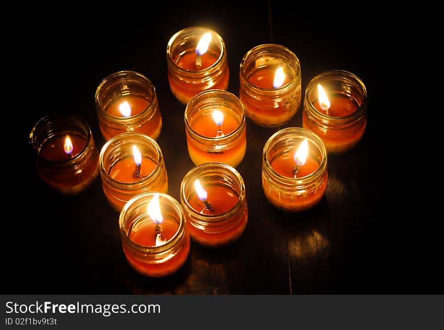 Lit Candles in room without lights