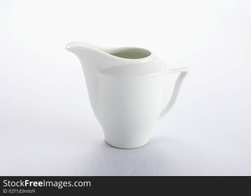 white pitcher on white background