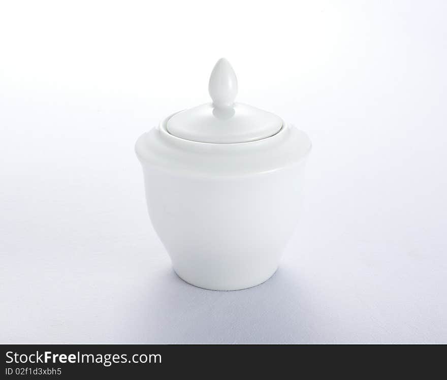 White sugar container on white