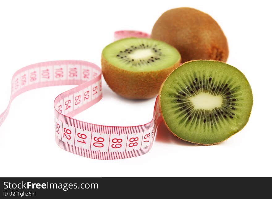 Juicy fresh kiwi fruit with tape measure isolated on white background. Juicy fresh kiwi fruit with tape measure isolated on white background