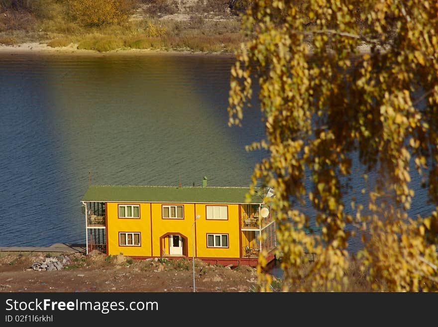 Boat station on the autumn river