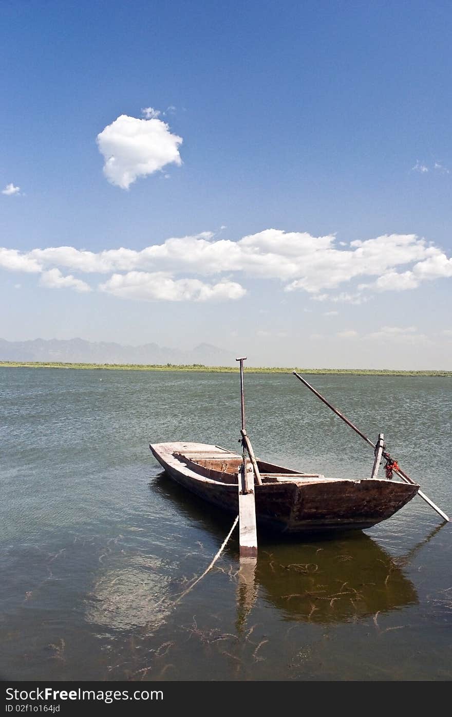 A boat is floating in a lake