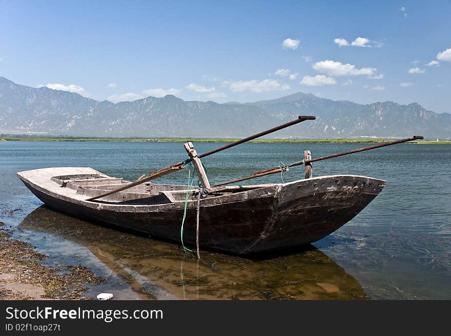 A boat is floating in a lake