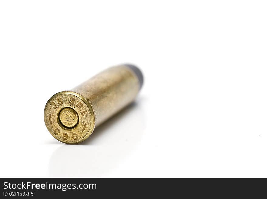 One bullet isolated on a white background. One bullet isolated on a white background.