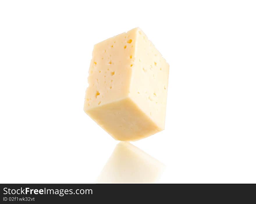 Piece of cheese on a white background