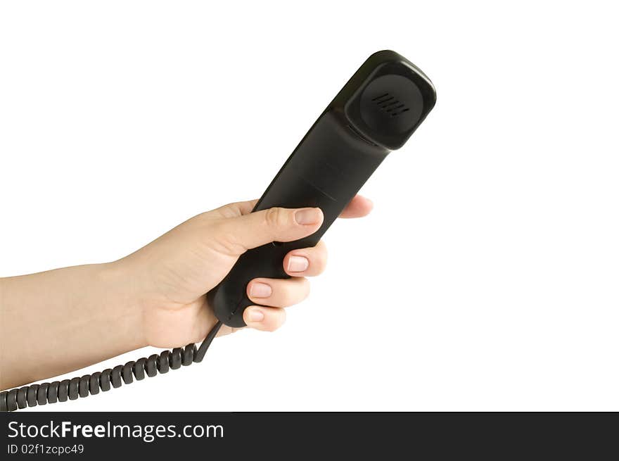 Handset in hand on a white background