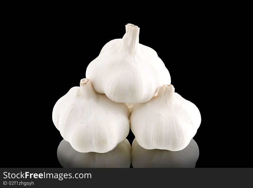 Garlic on a black background