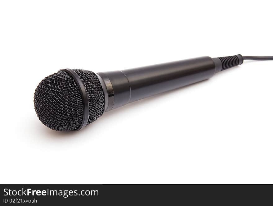 Black microphone isolated on white background