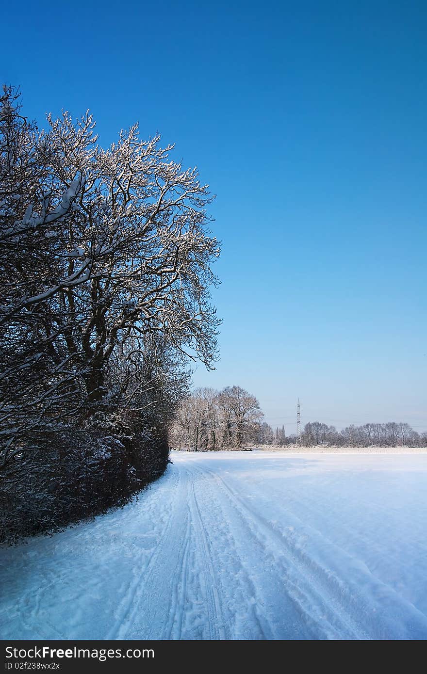 Empty road in tranquill winter scene