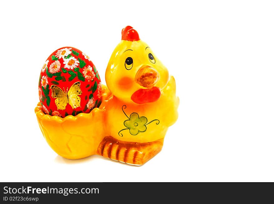 Easter egg on a funny support-yellow chicken. Easter egg on a funny support-yellow chicken.